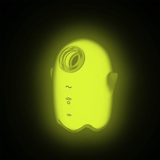 Satisfyer Glowing Ghost Yellow Air Pulse Stimulator glowing with black background