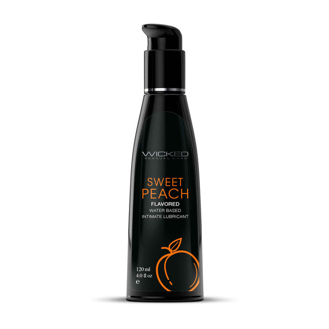 A black bottle of Wicked AQUA Sweet Peach water-based lubricant with a pump dispenser and orange peach graphics.