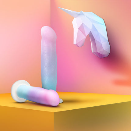 Avan D17 Lucky 8 Inch Rainbow Dildo laying on ground with Unicorn