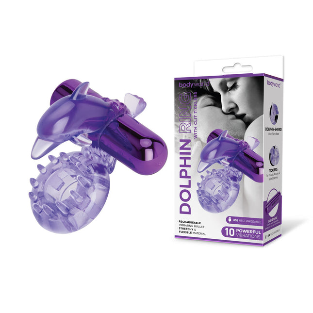 A purple USB rechargeable vibrating cock ring with a dolphin-shaped external stimulator. The product is shown alongside its packaging.