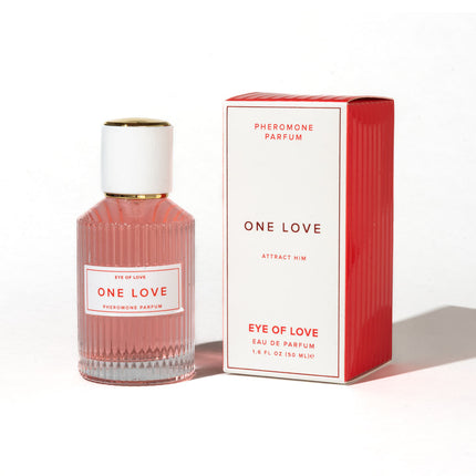 Pink perfume bottle and red box labeled 'One Love' on a white background
