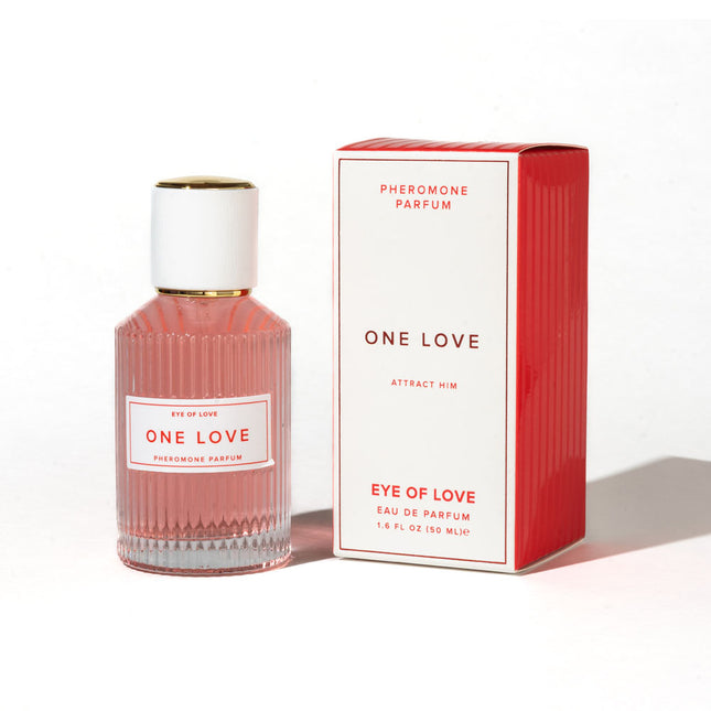 Pink perfume bottle and red box labeled 'One Love' on a white background