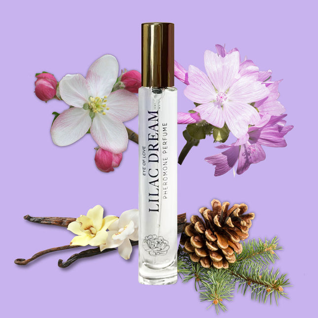 Perfume bottle labeled 'Lilac Dream' surrounded by flowers and natural elements on a purple background