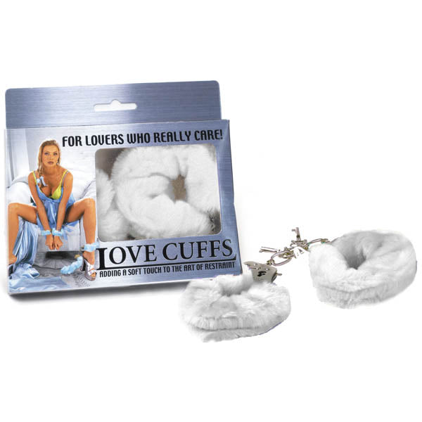 A pair of white fluffy handcuffs packaged in a box with a model demonstrating their use. The product is intended for lovers who care about comfort.