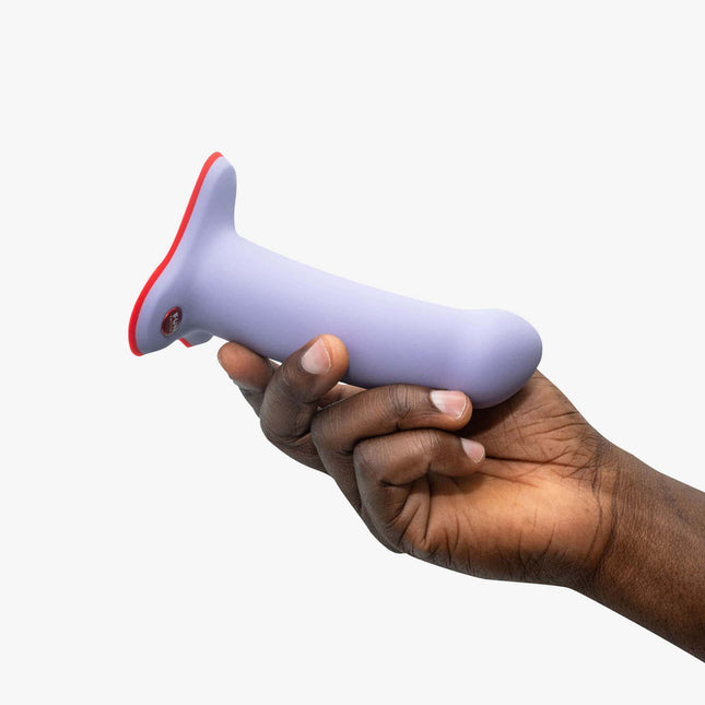 hand holding FUN FACTORY AMOR Lavender – Small 5 Inch Hands-Free Dildo