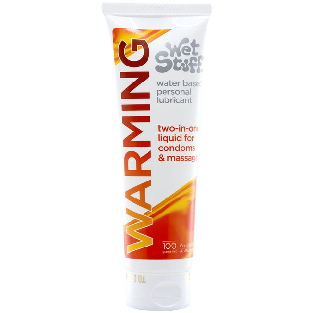 A tube of Wet Stuff Warming water based lubricant in 100g size with red and yellow packaging.