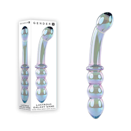 A glass massager with a curved end and a beaded end, featuring iridescent blue, green, and violet coloring. The product is shown both in and out of its packaging.