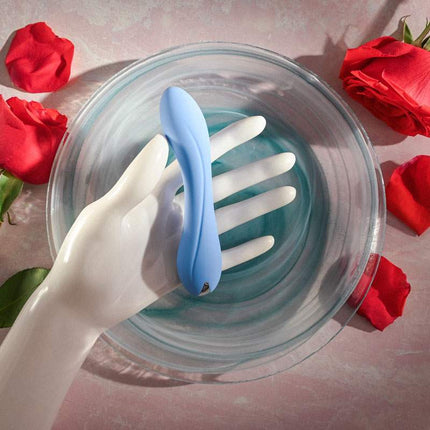 Hand Holding Small Evolved BLUE CRUSH Mini Vibrator