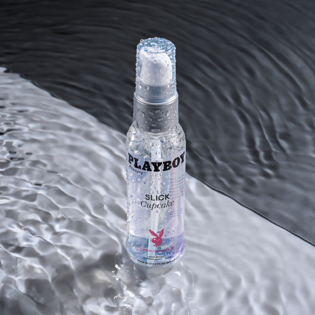 Playboy Pleasure SLICK CUPCAKE Flavoured Water Based Lubricant - 60 ml with water background