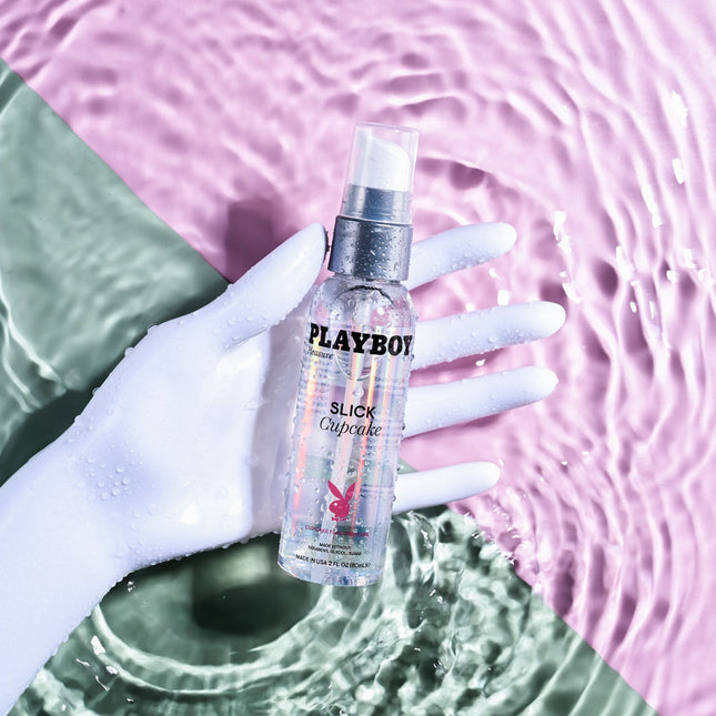 Hand Holding Playboy Pleasure SLICK CUPCAKE Flavoured Water Based Lubricant - 60 ml