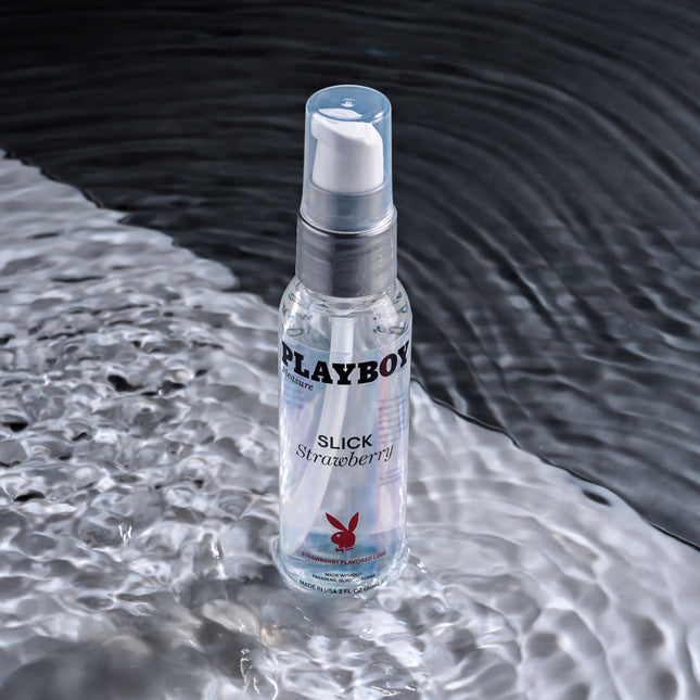 Playboy Pleasure SLICK STRAWBERRY Flavoured Water Based Lubricant - 60 ml in water background