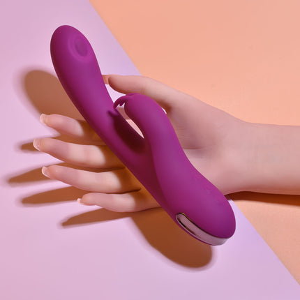 hand holding Playboy Pleasure THUMPER Purple Rabbit Vibrator