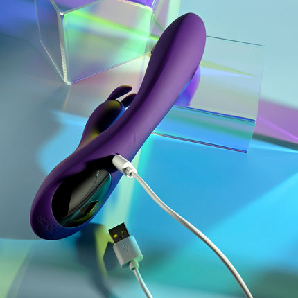 Playboy Pleasure On Repeat Purple Rabbit Vibrator Charging