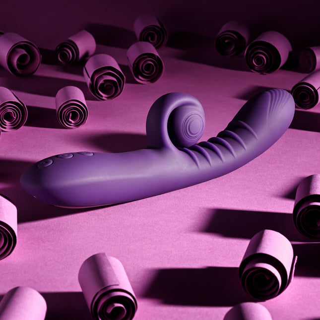 Playboy CURLICUE Purple Rabbit Vibrator Side View on Ground