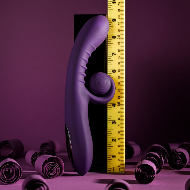 Ruler side by side the Playboy CURLICUE Purple Rabbit Vibrator
