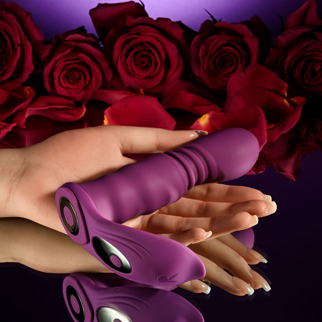 hand holding Playboy Pleasure MATCH PLAY Pink Couples Vibrator