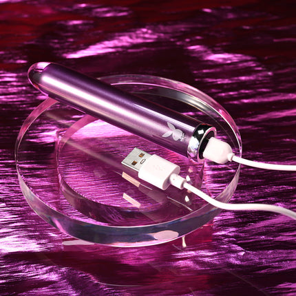 USB Rechargeable Purple Playboy Bullet Vibrator on clear stand