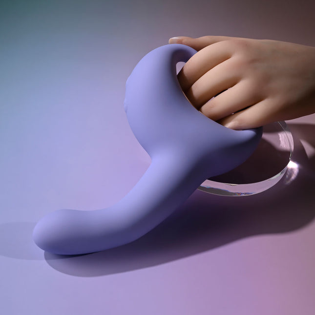hand holding Playboy Pleasure NICE TO MEET YOU Purple Vibrator