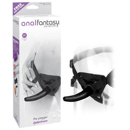 The image shows the product packaging and the anal fantasy the pegger. The packaging is predominantly black and white with a close-up of the strap-on.