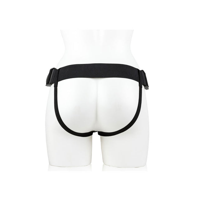 White manakin wearing Black strapon harness 