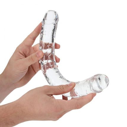 Hand holding a REALROCK 14 Inch Double Dildo - Clear