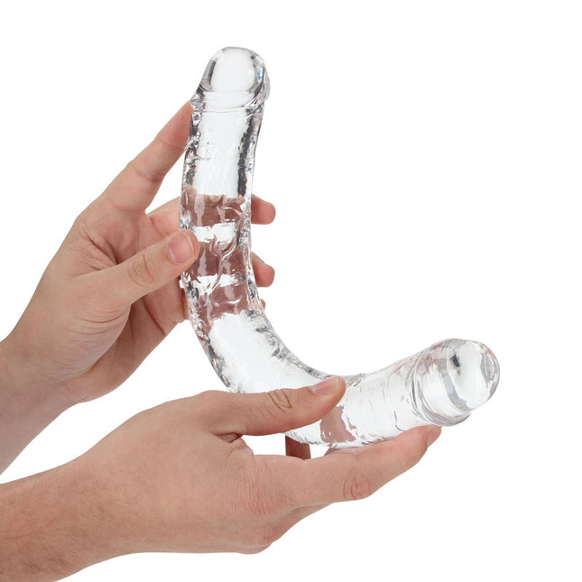 Hand holding a REALROCK 14 Inch Double Dildo - Clear