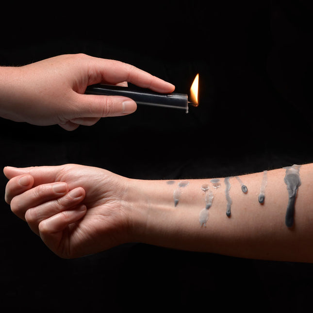 LaCire Black Drip Pillar Candles Hand