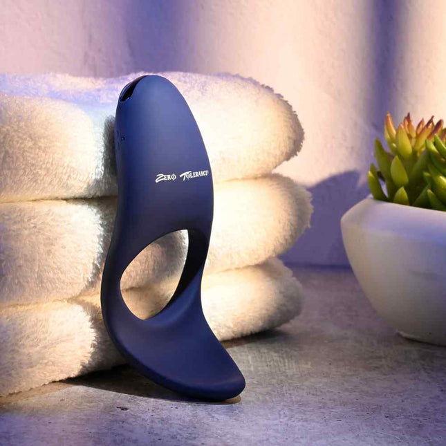 Zero Tolerance CUP 'EM Vibrating Cock Ring Blue against towels